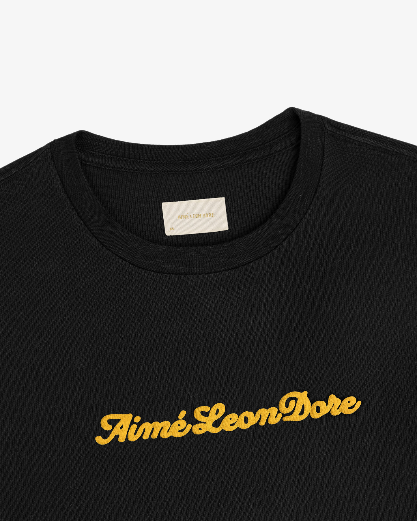 Aime Leon Dore Puff Print Tee - black, yellow | Saturday Concept