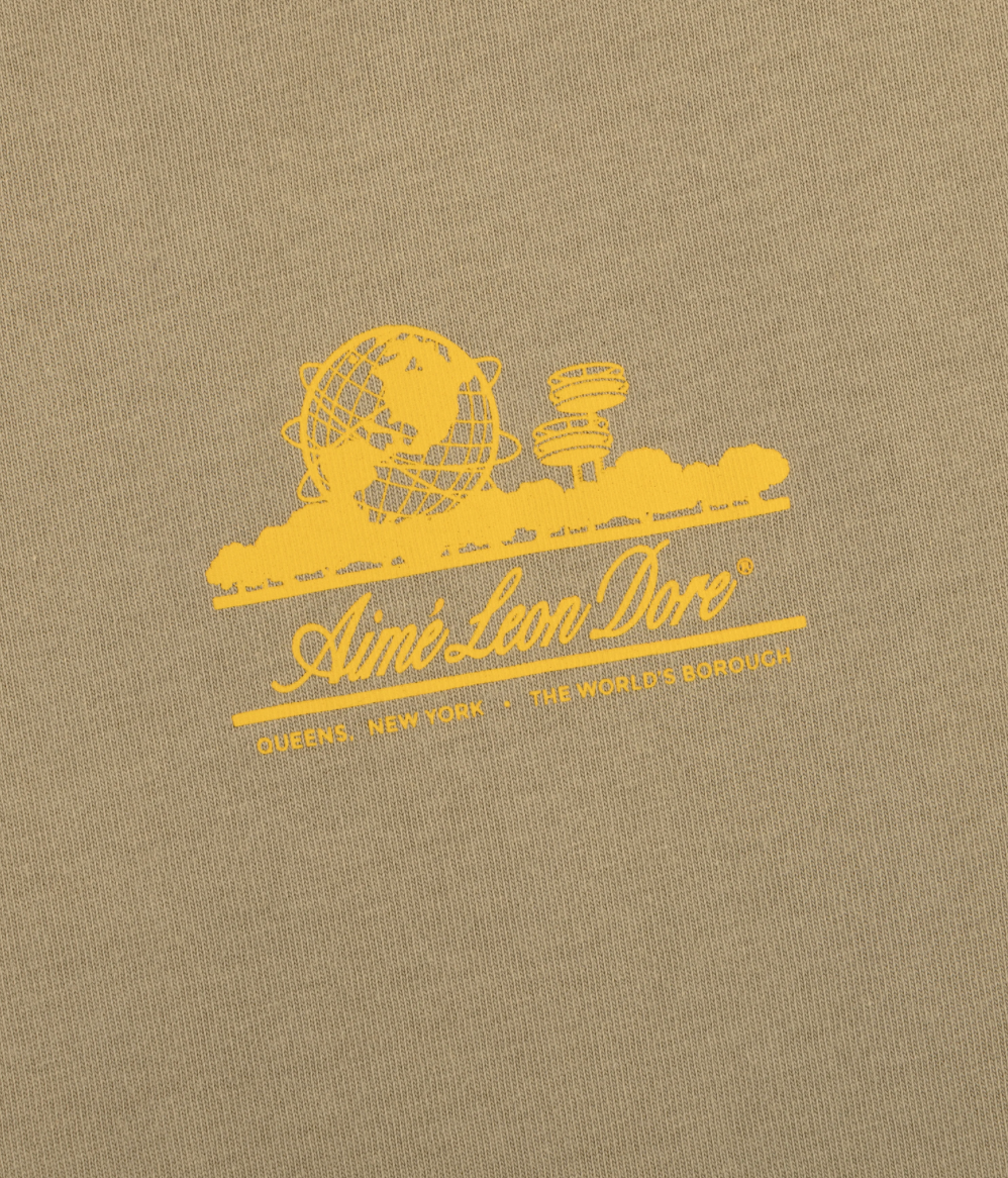 Aime Leon Dore Sun Faded Unisphere Oak Tee - brown | Saturday Concept